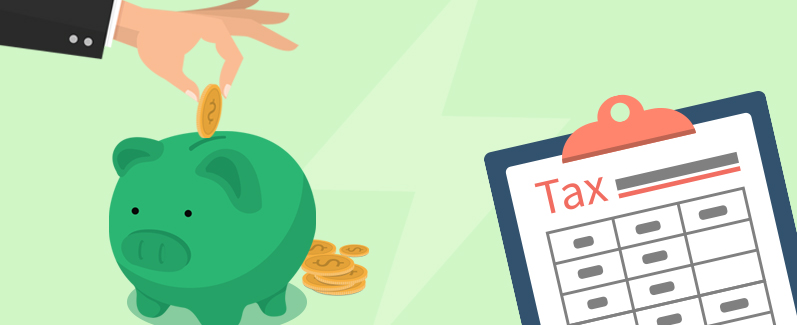 A hand places coins in a piggy bank.