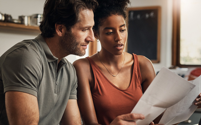 A couple reviewing their tax information together.