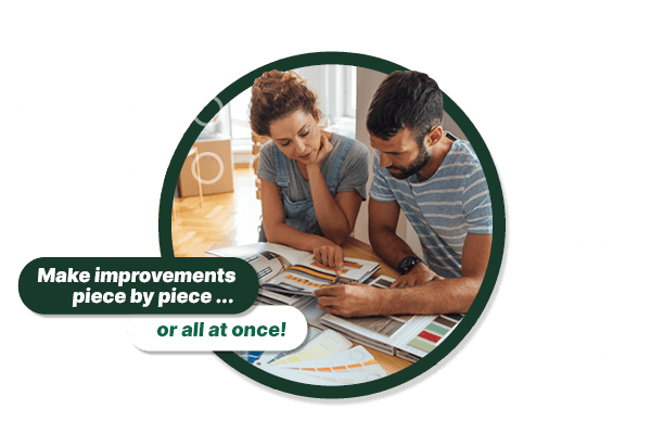 Couple reviewing paint samples and renovation plans.