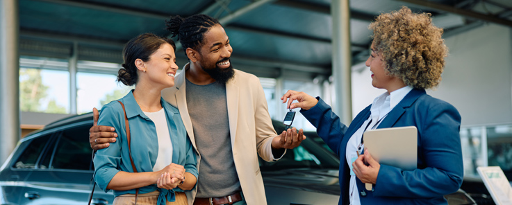 gap coverage - keys being handed to a couple in front of a car