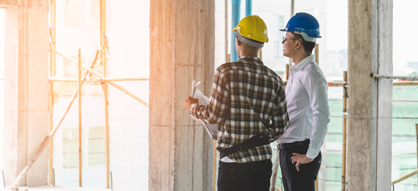 Contractor walking through building